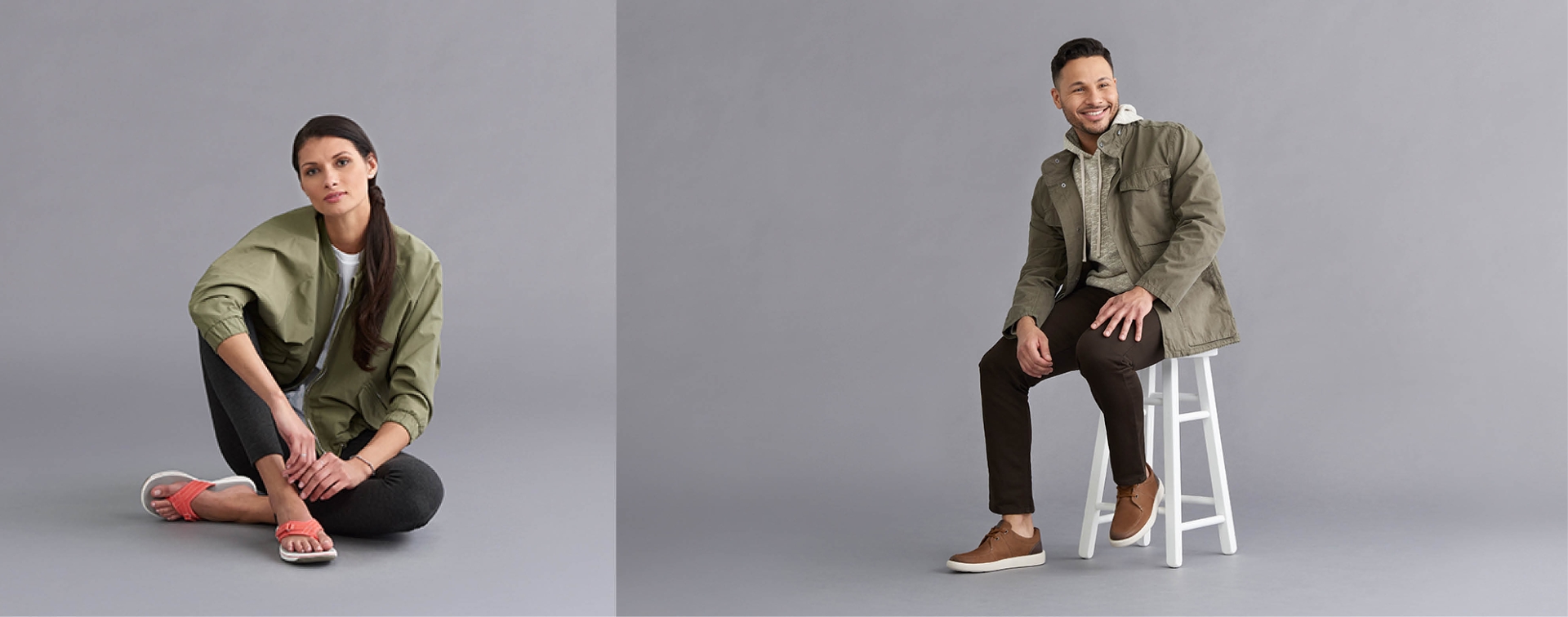 Girl sitting against gray background with pink flip flops on. Guy sitting on stool abasing gray background with brown sneakers on.