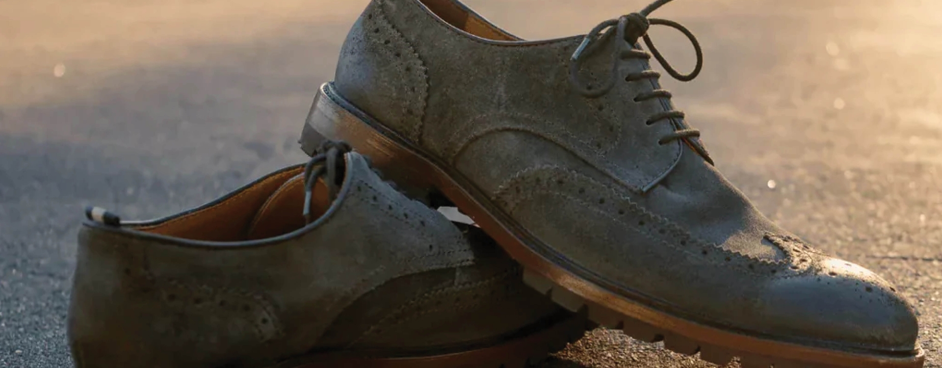 mens dress shoes stacked on top each other 